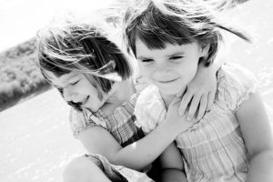 1156103_twin_little_girls_by_the_water_2