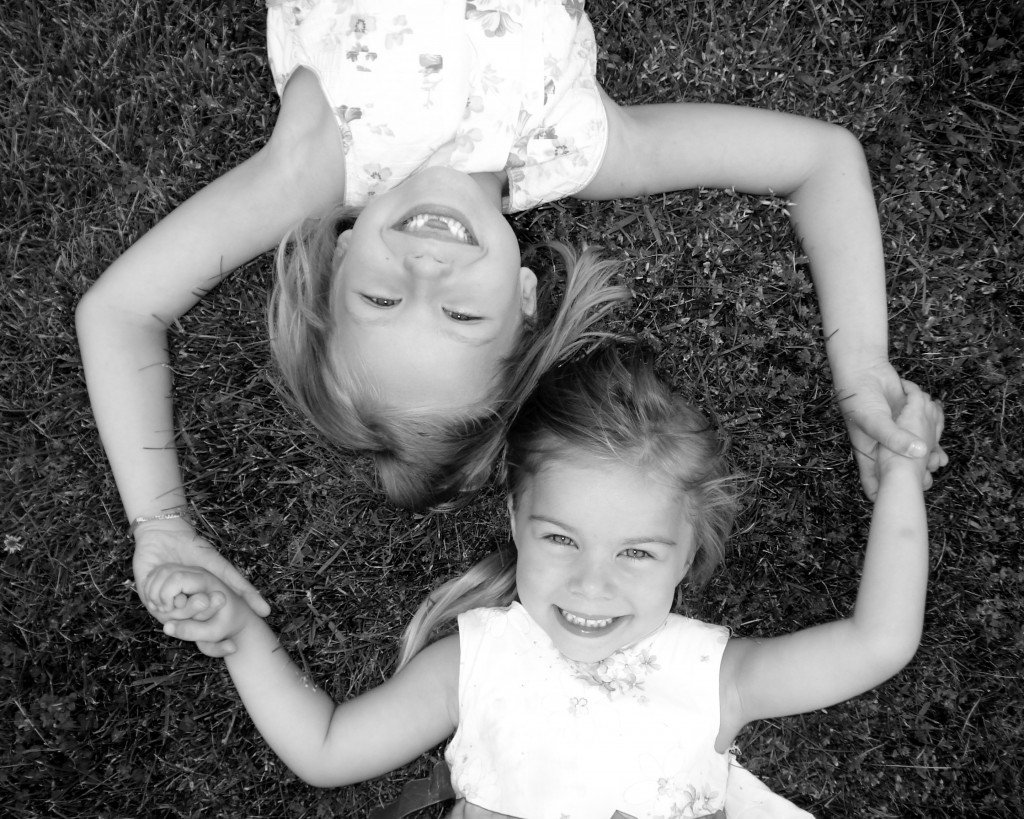 Sisters holding hands